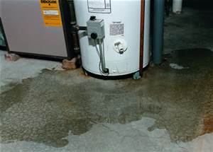 Kelowna and West Kelowna Plumbers - A1 Choice - water leaking around hot water tank