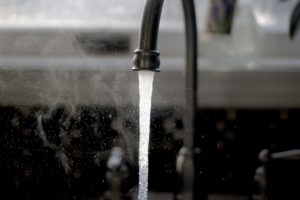 Faucet pouring water